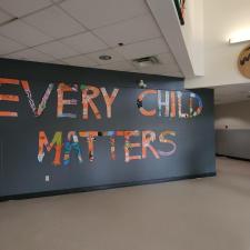 Large scale "Every Child Matters" in the front foyer of school