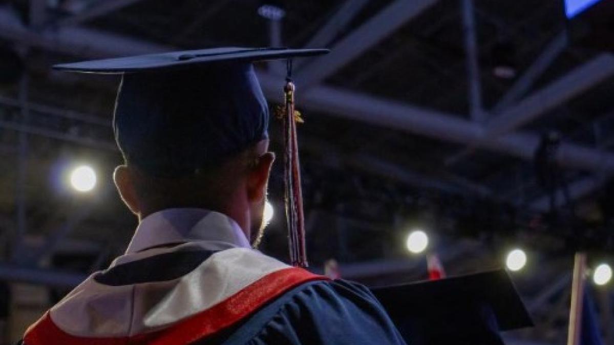 Graduate with Cap and Gown