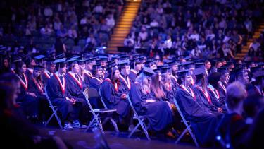 Graduates seated at ceremony