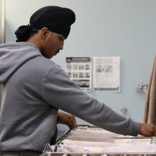 Internship student preparing heating pads for patients